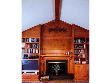 Intricate wood burning fireplace in great room