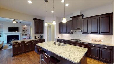 Kitchen is open to the great room.  Gas cooktop