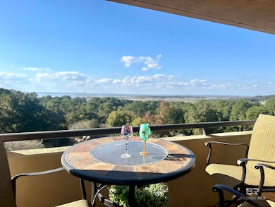 Balcony with a view Mobile Bay beyond the canopy of Daphne trees