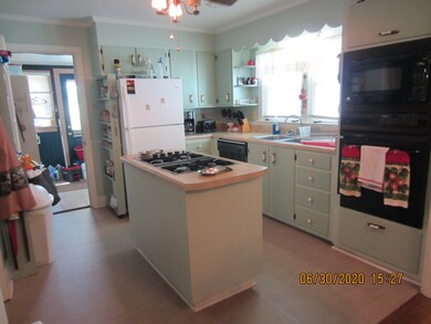 VERY NICE KITCHEN WITH BUILT IN GAS RANGE, BUILT IN OVEN AND MICROWAVE , DISHWASHER AND REFRID. WHICH REMAINS WITH THE HOUSE