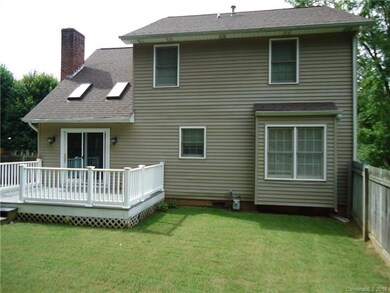 Deck overlooking private back yard.  New sliding g