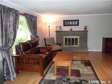 Living Room BEAUTIFUL HARDWOODS AND WOOD BURNING F