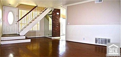 Newly painted living room with wooden floors