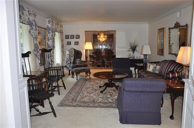 Formal living room opens into the dining room.