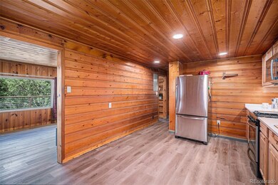 11080 S Deer Creek Rd, Littleton, CO 80127 - photo 7