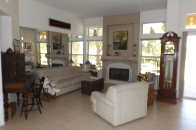 LIVING ROOM W/BUILT-IN GAS FIREPLACE.