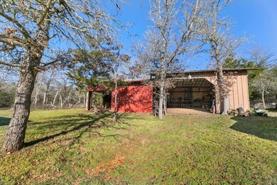 View of yard featuring an outbuilding and an outd
