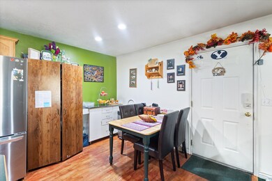 Dining room featuring light wood finished floors and recessed lighting