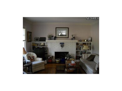 Beautiful hardwoo floors, and crown molding add ch