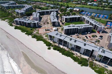 Drone / aerial view with a view of the beach and a
