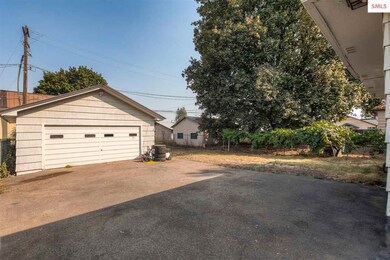 Double car, drive through garage has two garage do