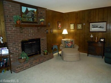 Den/Family/Great Room. Cozy up by the gas fireplace in the den.