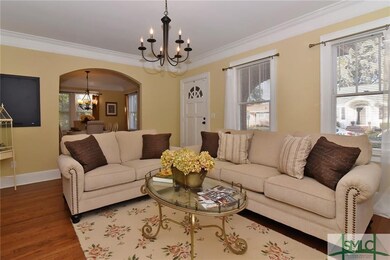 LIVING ROOM W/ARCHWAY TO DINING ROOM