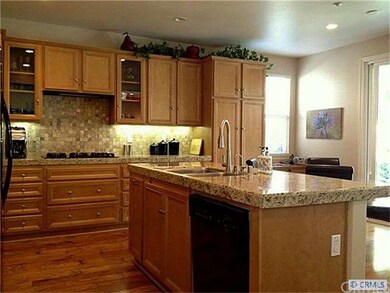 View of the Kitchen - note the stone back splash