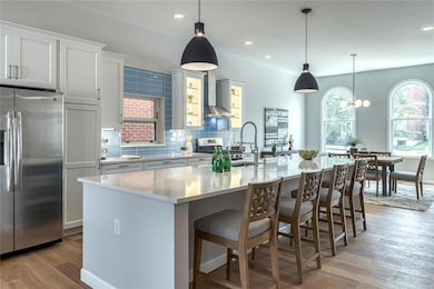 Recess lights. Arched front wood windows. 10 ft ce