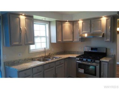 Kitchen Updated kitchen with refinished cabinetry,