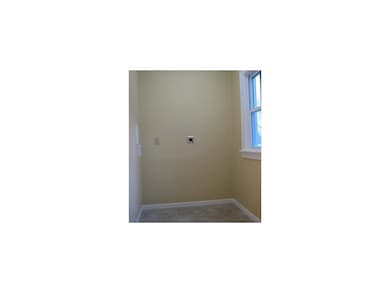 Laundry Area. Nice laundry room off kitchen.