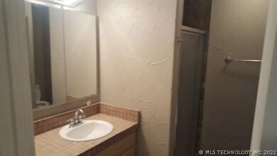 Master bath with separate  tub and shower