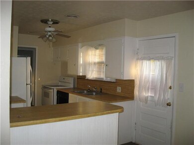 Kitchen. Complete with dishwasher, refrigerator an