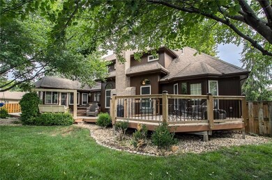 Massive deck on the backside of the house with 3 entry points.