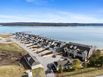 860 Pointe Dr unit 64, Boyne City, MI 49712 - photo 5