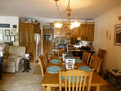 View of dining room and kitchen