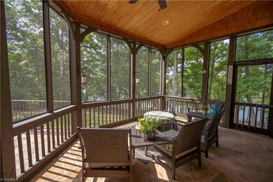 Screened porch for relaxing evenings overlooking the lake