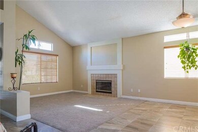 family room with fireplace, new carpet and new til