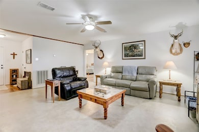This cozy living room features neutral tones, The