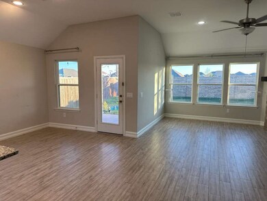 Unfurnished living room with recessed lighting, lofted ceiling, light wood-style flooring, and a ceiling fan
