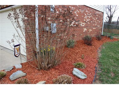 Attractive landscaping at the right of the house