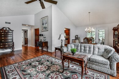 The two bedrooms are in the front of the home while the master is nestled in the back, which you can see through the hallway on the left of the picture.