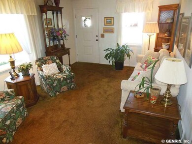 Living Room. hardwood under carpet