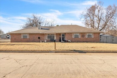 Single story home featuring a front lawn