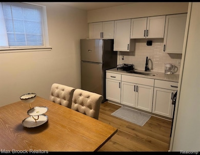 8251 Denwood Dr unit G1, Sterling Heights, MI 48312 - photo 6