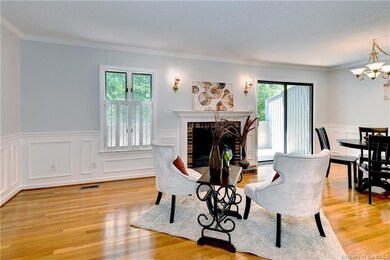 The family room opens to the kitchen as well as a 