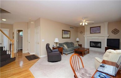 Enjoy your new home by this cozy fireplace and wal
