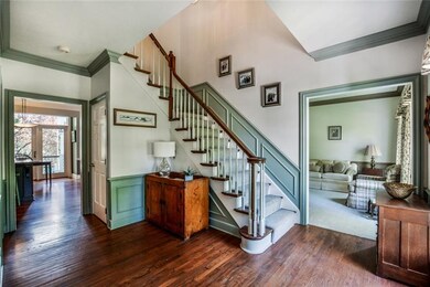 Beautiful Brazilian cherry floors flow from the en