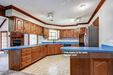 4100 Honeysuckle Cir, Middleburg, FL 32068 - photo 4