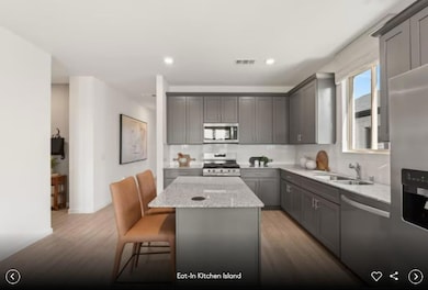 Interior photos- Photo of Pulte model home with same floor plan, not of actual home listed.