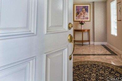 Elegant marble tile front entry