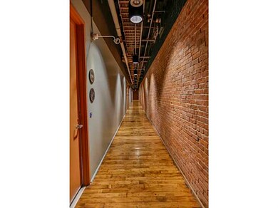 Exterior Front. Hallway to Unit