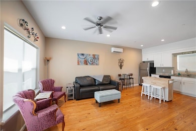 Living area featuring light wood finished floors, 