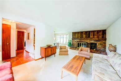 Entry w/center hallway is ceramic tile-- hardwood 