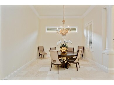 Dining Room w/ beautiful crystal chandelier.