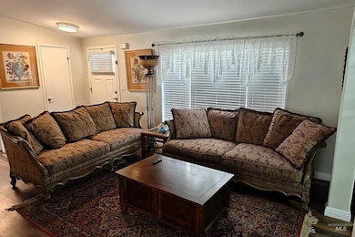 Living room with wood finished floors