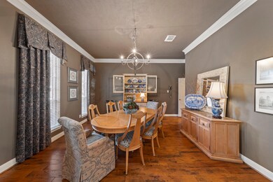 The spacious dining room features floor-to-ceiling