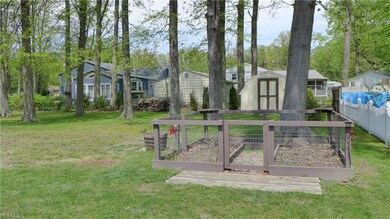 Right Side of Yard showing Fenced In Garden