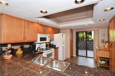 Lovely new kitchen cabinets with stackable washer 
