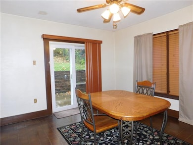 Spacious dining room with a sliding glass doors th